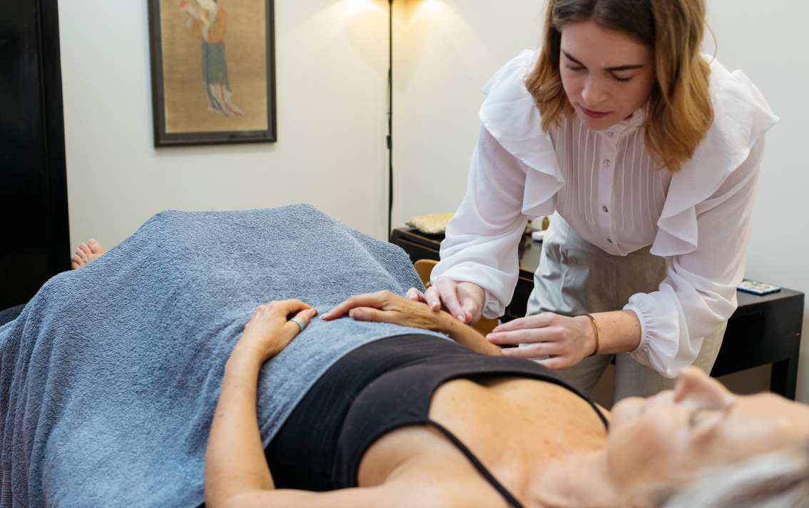 A patient receives acupuncture