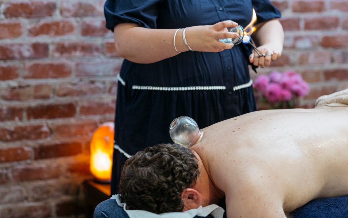 A patient receives cupping